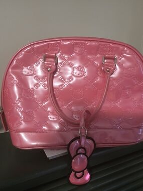 Hello Kitty Pink Patent Dome Tote with Bow Charm- See pics for condition.